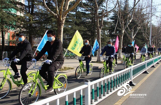 市区公共自行车系统开展“学习雷锋树新风 文明出行我践行”主题活动1